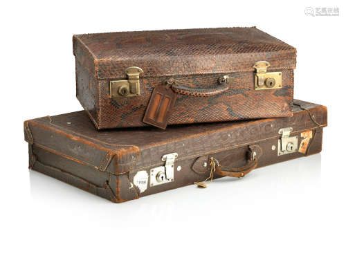 Two early 20th century crocodile and snake skin suitcases