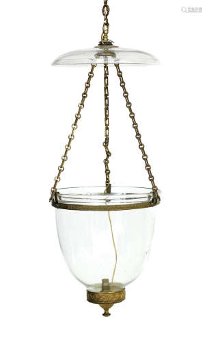 An early 19th century glass and gilt metal hall lantern