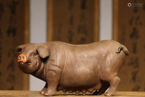 A SOW DESIGN PURPLE CLAY ORNAMANT