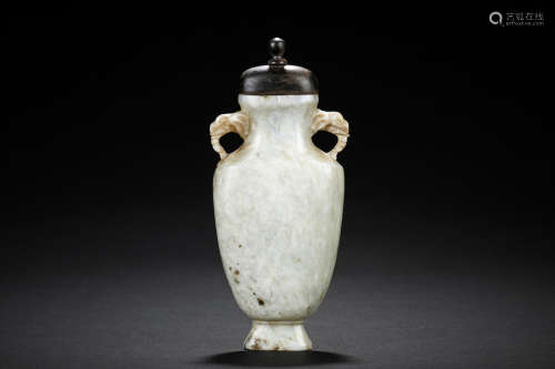 A CARVED JADE BOTTLE VASE WITH ZITAN COVER