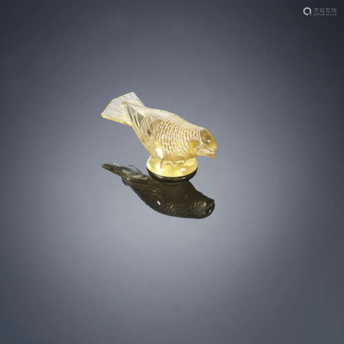 A 'Chardonneret Timide' Paperweight, designed in 1931 René Lalique (French, 1860-1945)