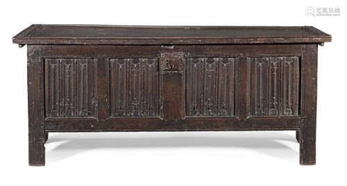 A rare mid-16th century joined and boarded oak linenfold-carved coffer, English, circa 1550