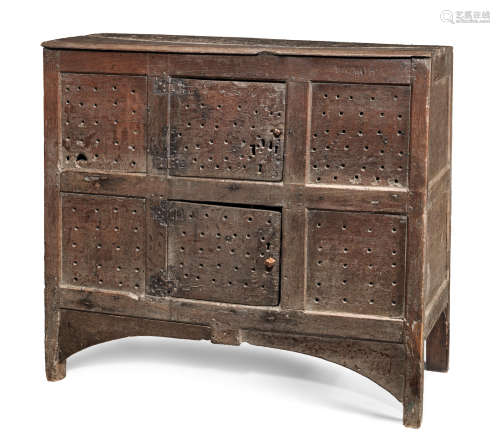 A rare mid-16th century joined oak food cupboard, English, circa 1550