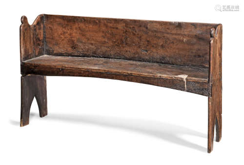 Circa 1800, in the 16th century manner A boarded elm settle, probably West Country