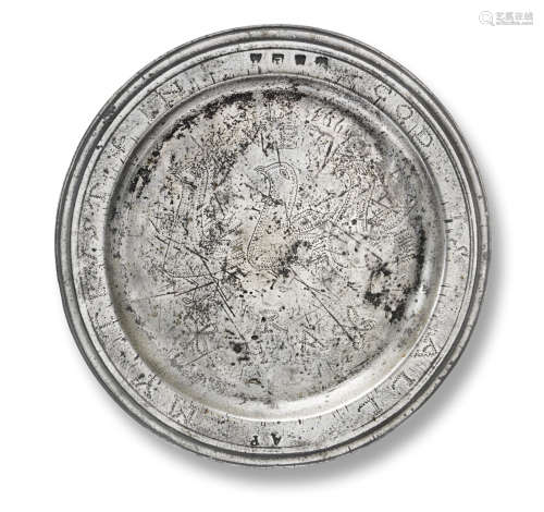 A rare Charles II pewter narrow-rim, wriggle-work decorated and 'axiom' inscribed plate, circa 1680