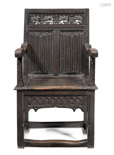 A rare Henry VIII joined oak triple panel-back open armchair, circa 1540