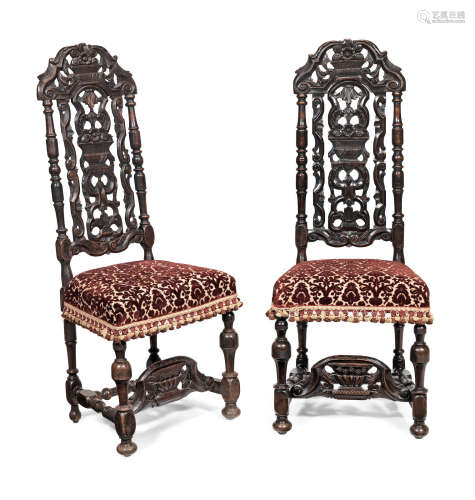 In the so-called Marot style, after Daniel Marot (1663-1752) A pair of joined walnut and upholstered high-back side chairs, Anglo-Dutch, circa 1700-1715