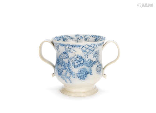 An exceptionally large Staffordshire 'scratch blue' saltglaze loving cup, circa 1760