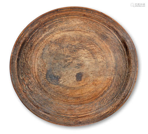 A large turned timber Winowing tray, probably Indian