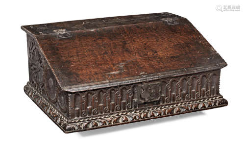 An Elizabeth I/James I carved oak boarded desk box, circa 1600-1620