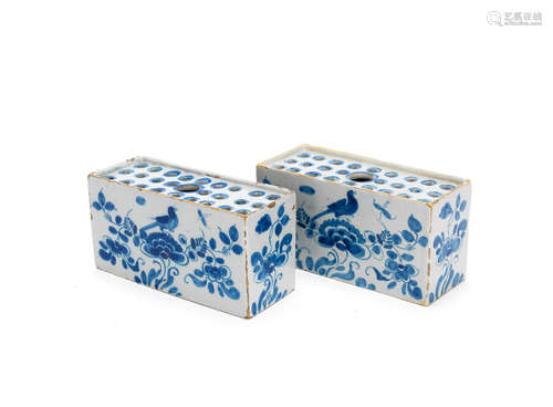 A pair of English delftware flower bricks and a single flower brick, circa 1750-60