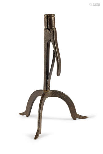 An unusual mid-19th century wrought iron spring-action table candleholder, circa 1850