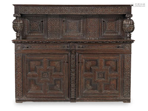 An impressive James I joined oak court cupboard, West Country, possibly Exeter, circa 1620