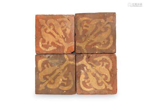 Four medieval encaustic floor tiles, 14th century