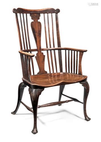 In the manner of John Pitt (d.1759) and Richard Hewett (d.1777) A rare and large George III cherry-wood, walnut and elm comb-back Windsor armchair, Thames Valley, circa 1760