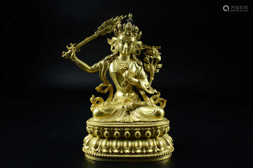 GILT BRONZE CAST MANJUSRI SEATED FIGURE