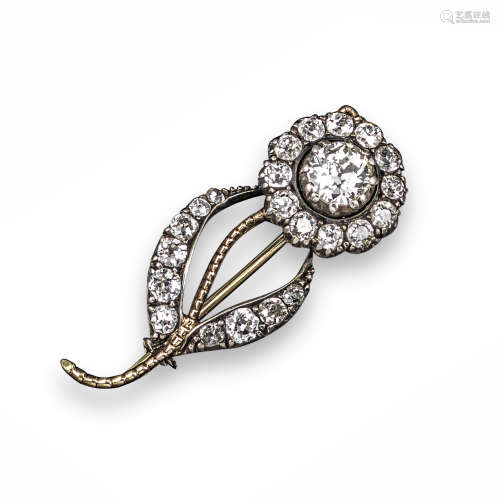 A Victorian diamond-set floral brooch, centred with an old circular-cut diamond within a surround of