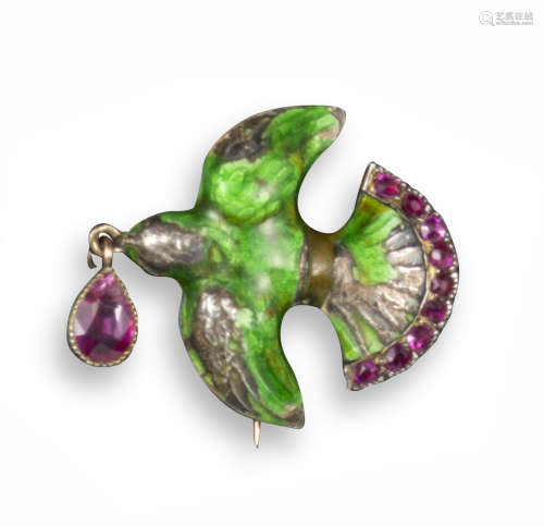 An enamel and ruby dove brooch by Child & Child, decorated with green enamel (damaged) and rubies