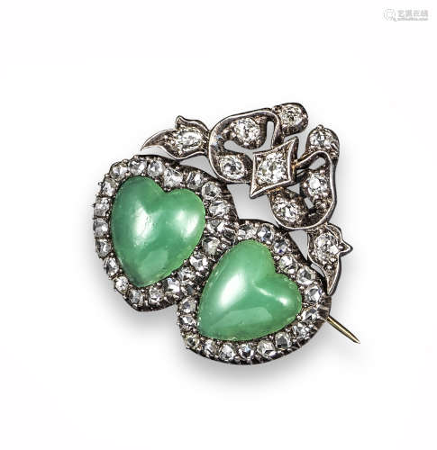 A Victorian double heart brooch, set with two chrysoprase heart-shaped cabochons with a surround