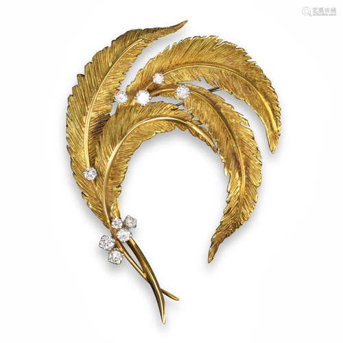 A gold and diamond-set feather brooch by Cartier, c1970, realistically formed and set with graduated