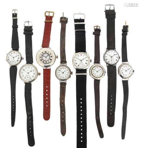 Eight silver wristwatches by Longines, manual movements, on leather and fabric bands