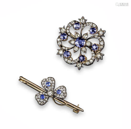 A Victorian sapphire and diamond brooch pendant, set with a central circular-cut sapphire within