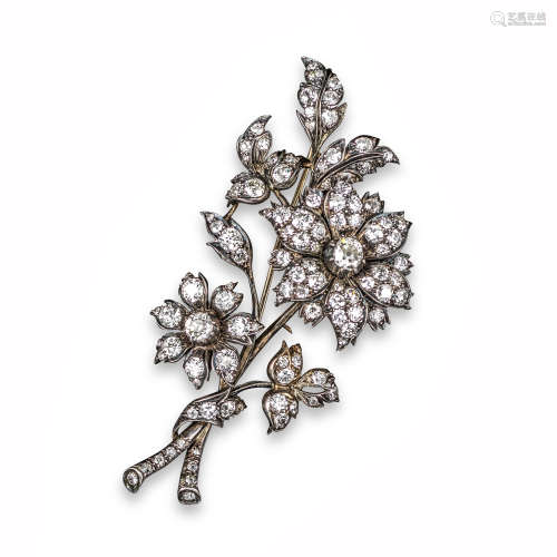 A late 19th century diamond foliate brooch, the largest flowerhead mounted 'en tremblant', pavé-