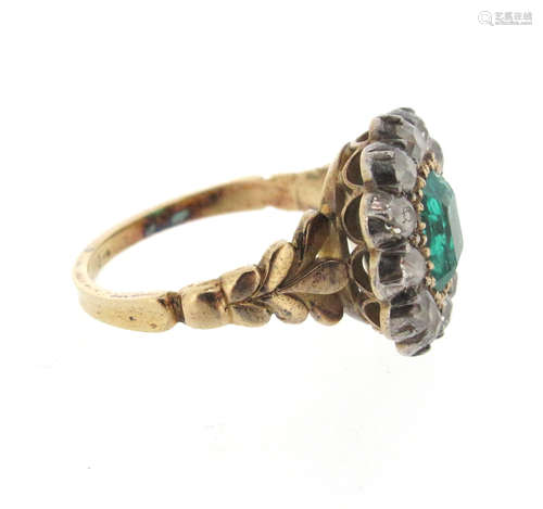 A Regency emerald and diamond cluster ring, c1830, the emerald-cut emerald is set within a