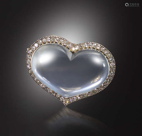 A Victorian moonstone and diamond brooch, the heart-shaped moonstone cabochon is set within a