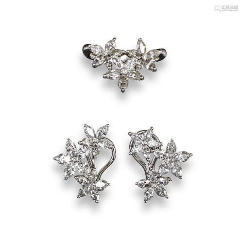 A pair of diamond flowerhead earrings by David Morris, set with graduated marquise-shaped diamonds