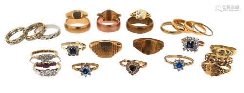 A mixed quantity of twenty six rings, including twelve plain gold rings, and eleven gem-set and