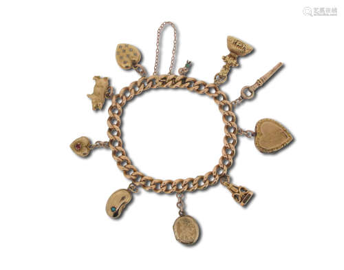 A gold charm bracelet, the curb-link bracelet suspends assorted gold and gem-set charms, 18cm