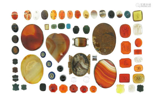A collection of assorted hardstone mounts and seventeen carved hardstone intaglios