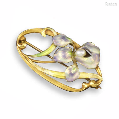 An Art Nouveau floral brooch, the realistically formed iris decorated with iridescent enamel and a