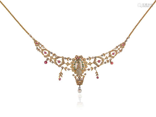 An early 20th century gold necklace, centred with a peacock motif, set overall with seed pearls,