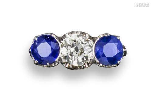 A sapphire and diamond three-stone ring, the old circular-cut diamond weighs approximately 1.08cts