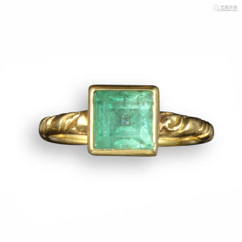 A mid 17th century emerald-set gold ring, possibly Spanish, set in a square collet with traces of
