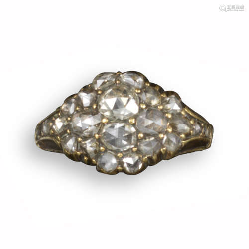 An early Victorian diamond-set cluster ring, pavé-set with rose-cut diamonds in gold with further