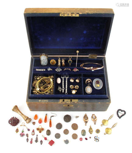 A jewellery casket with lift-out draw containing various items of jewellery, including an 18th