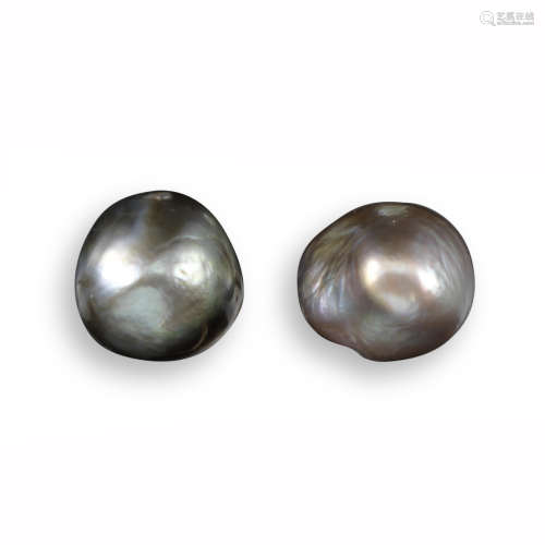 A pair of grey natural pearl earrings, the baroque pearls mounted on white gold studs, post fittings