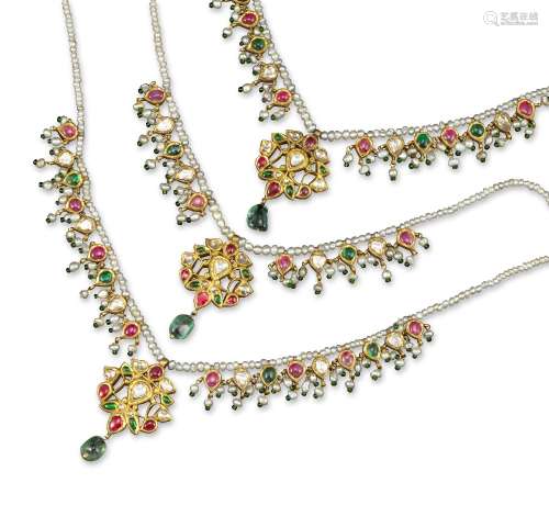 An Indian three-row seed pearl and gem-set necklace, each row centred with an openwork gold