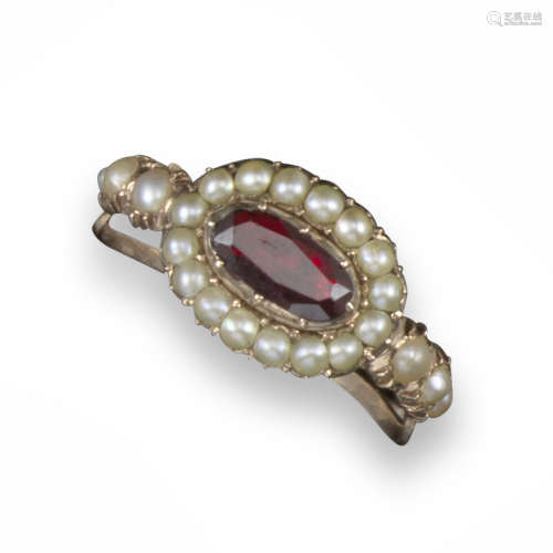 A George III garnet and seed pearl cluster ring, centred with an oval-shaped garnet set within a