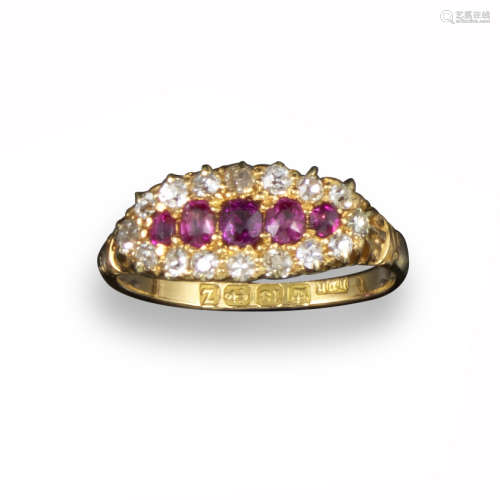 A ruby and diamond cluster ring, the navette-shaped ring set with a line of graduated cushion-shaped