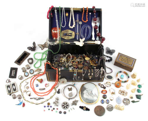 A jewellery casket containing various items of jewellery etc., including a large clasp containing an