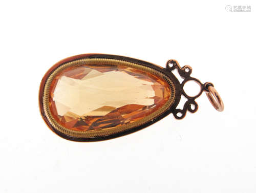 A topaz pendant, the orange briollette-shaped topaz set in yellow gold collet, 3.3cm high