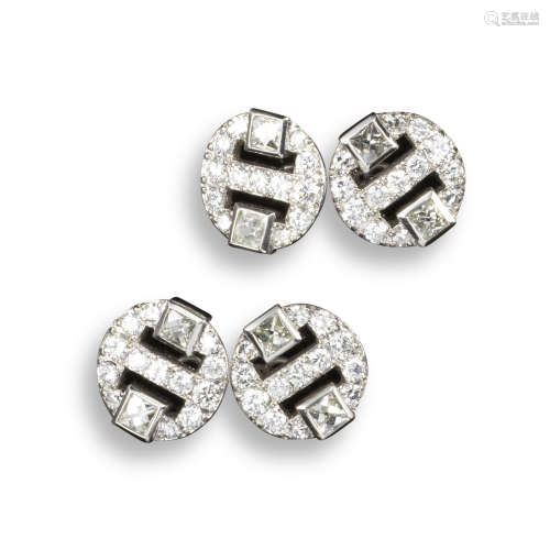 A pair of diamond cufflinks, each disc set with two French-cut diamonds within pierced circular disc