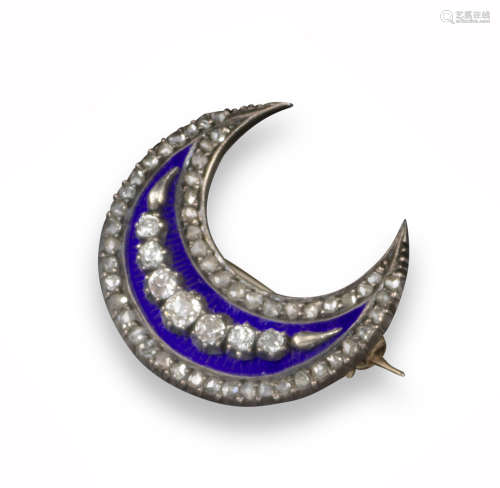 A late Victorian diamond-set crescent brooch, the closed crescent is set with a line of graduated