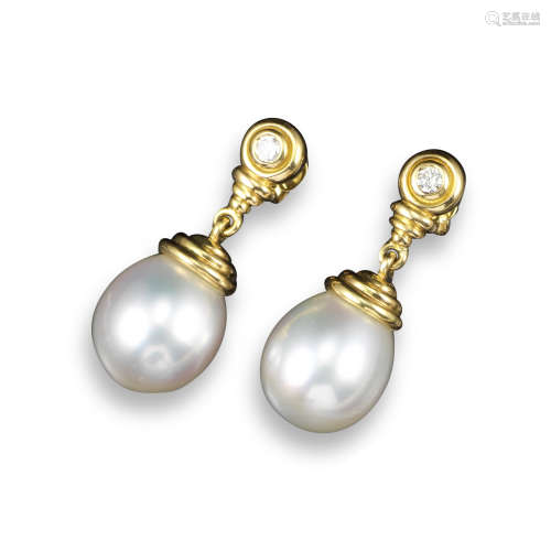 A pair of cultured pearl and diamond drop earrings, each round brilliant-cut diamond is set in