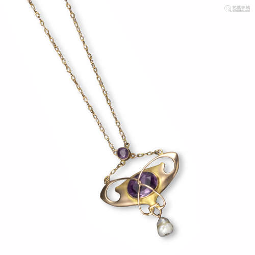 An Arts and Crafts amethyst and gold pendant by Barnet Henry Joseph, set with an oval-shaped