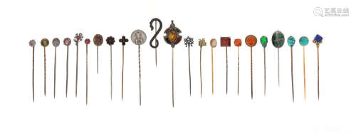 Twenty-two assorted stick pins, set with stones including a garnet, opal, ruby and turquoise From